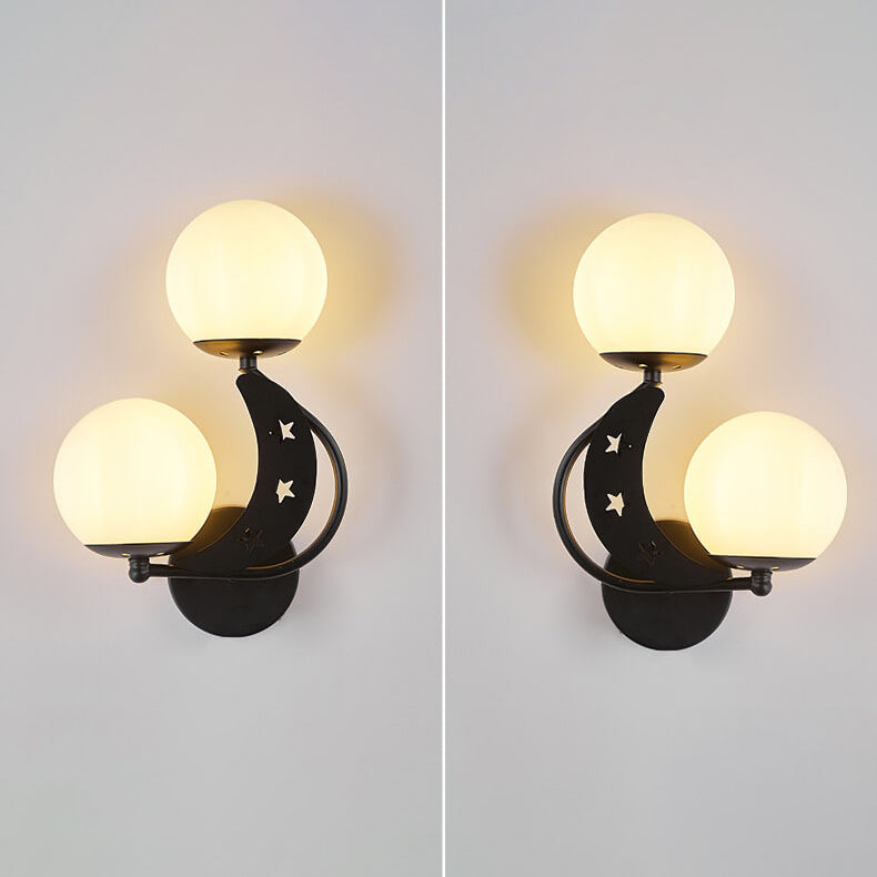 Zabrielle Nordic Iron Glass Globe Wall Sconce with Moon and Star Cutouts