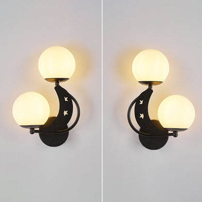 Zabrielle Nordic Iron Glass Globe Wall Sconce with Moon and Star Cutouts