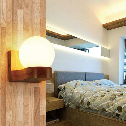 Adelphine Contemporary Rubberwood Wall Sconce with Glass Shade for Bedroom and Living Room