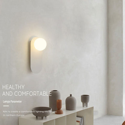 Elowen Minimalist Metal Ring Wall Sconce with Glass Shade for Hallway Lighting