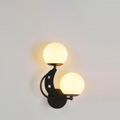 Zabrielle Nordic Iron Glass Globe Wall Sconce with Moon and Star Cutouts