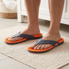 Acupressure Massage Flip-Flops Scale Reference - bare feet wearing flip-flops on bathroom mat