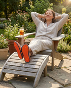 Acupressure Massage Flip-Flops Secondary Lifestyle - person relaxing on patio chair with feet elevated