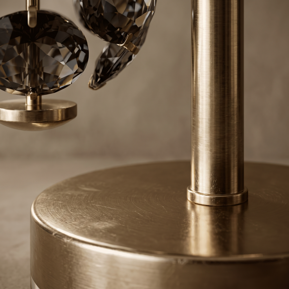 Close-up detail of the Lumandre table lamp metal finish where shade meets stem