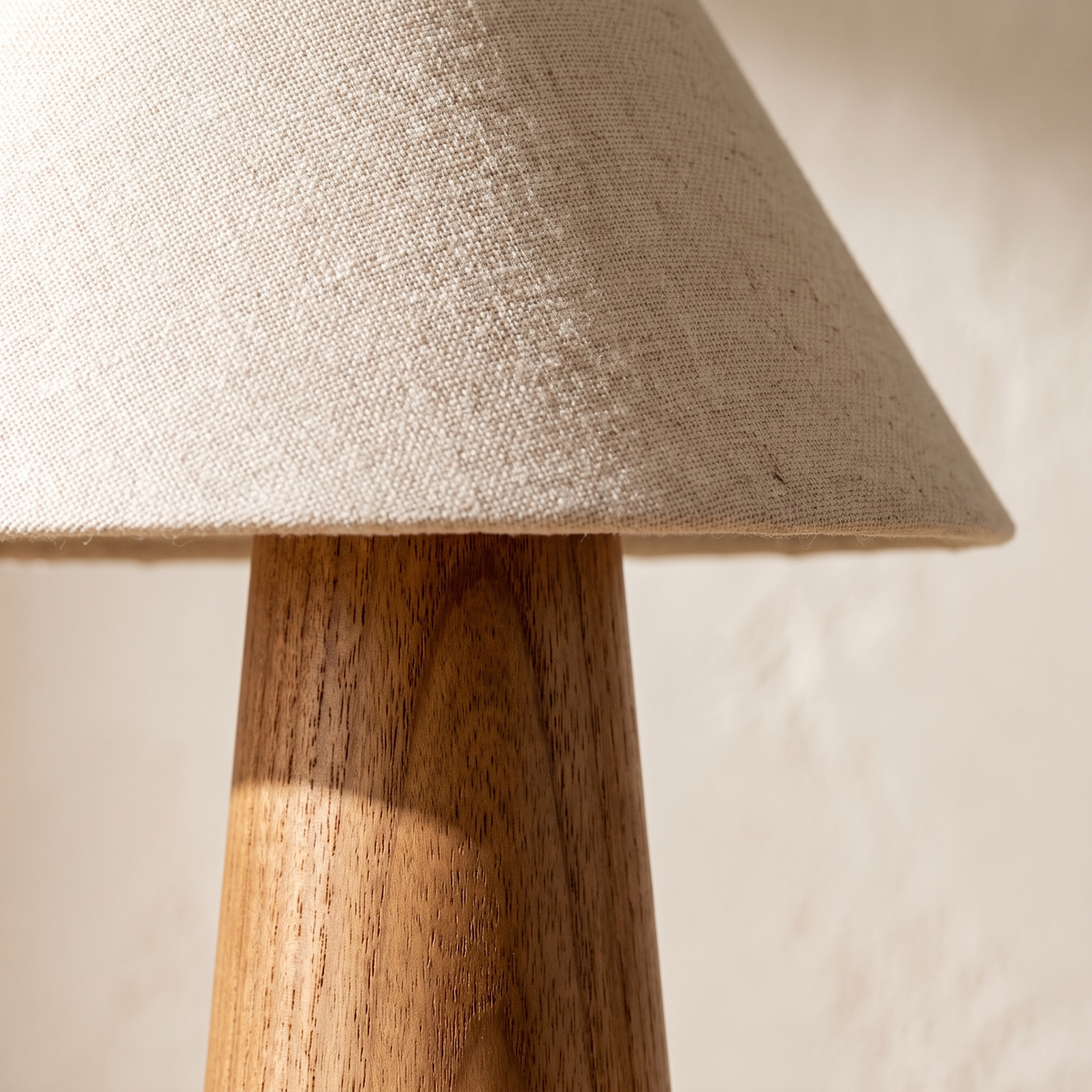 Verdoni table lamp macro of fabric weave and wood grain detail
