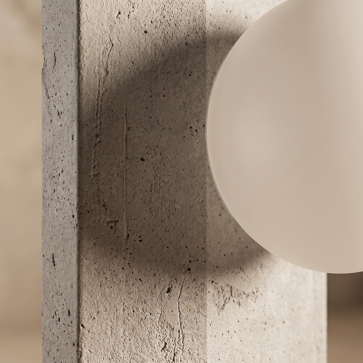 Solenne table lamp macro detail of cast concrete meeting glass diffuser