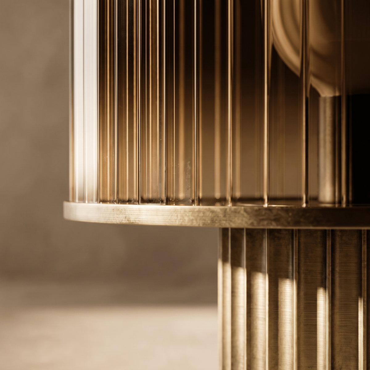 Macro detail of the Elmira lamp's ribbed smoked glass meeting its fluted brass base