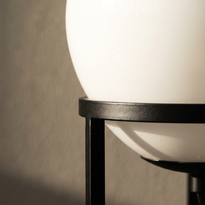 Close-up detail of the Isolde table lamp black metal and glass construction