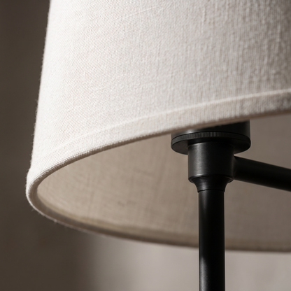 Tavernelle table lamp detail, fabric drum shade and black metal stem macro