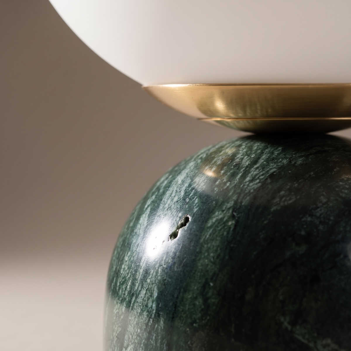 Willowmere table lamp macro, green marble veining and brass stem detail