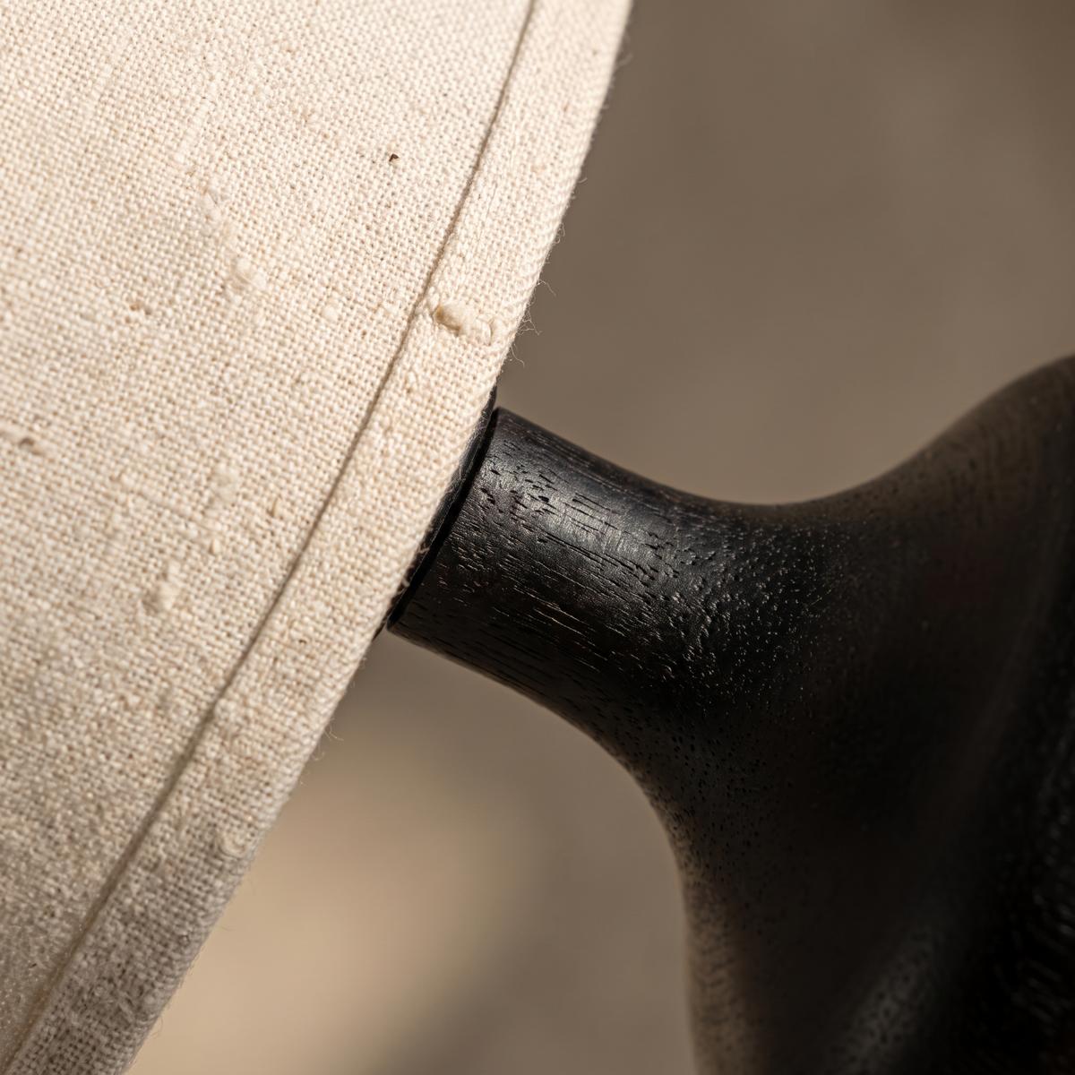 Xanthe table lamp macro, woven fabric texture and natural wood grain detail