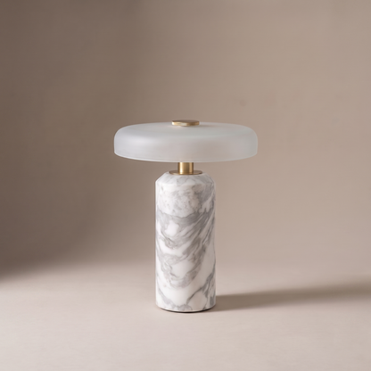 Ophira small glass and marble table lamp on a neutral studio backdrop