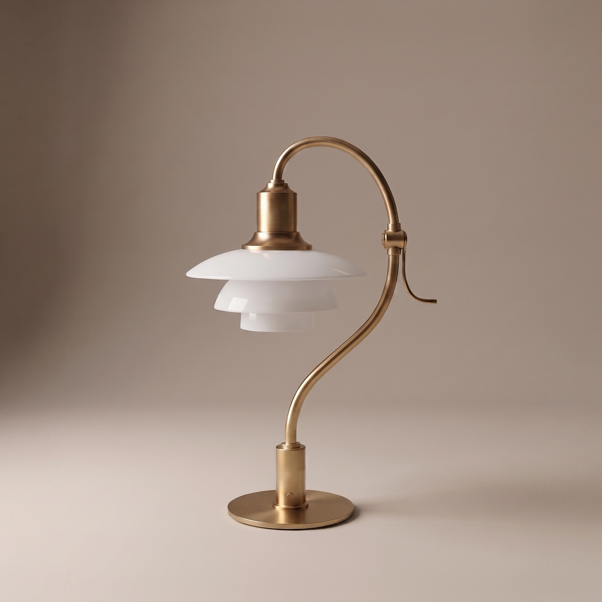 Bellamira modern metal E27 table lamp in brass finish, studio shot on warm-greige backdrop, lamp off