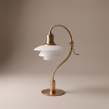 Bellamira modern metal E27 table lamp in brass finish, studio shot on warm-greige backdrop, lamp off