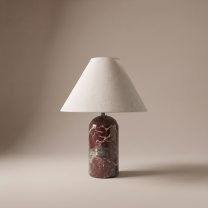 Vionelle red marble and cream fabric table lamp on a neutral studio backdrop
