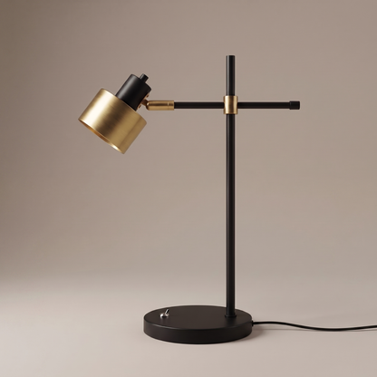 Sablette iron table lamp side profile showing black stem, crossbar arm and brass rotatable head, studio shot