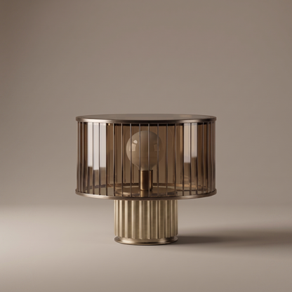 Elmira ribbed smoked amber glass drum shade table lamp on fluted brass base, studio product shot