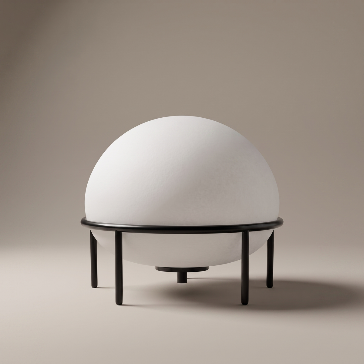 Isolde low-profile black glass and metal table lamp, clean studio view on neutral backdrop