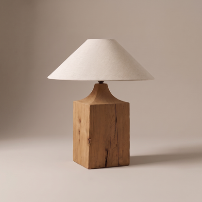 Lavelle rustic table lamp with cracked solid oak base and natural linen cone shade on studio backdrop