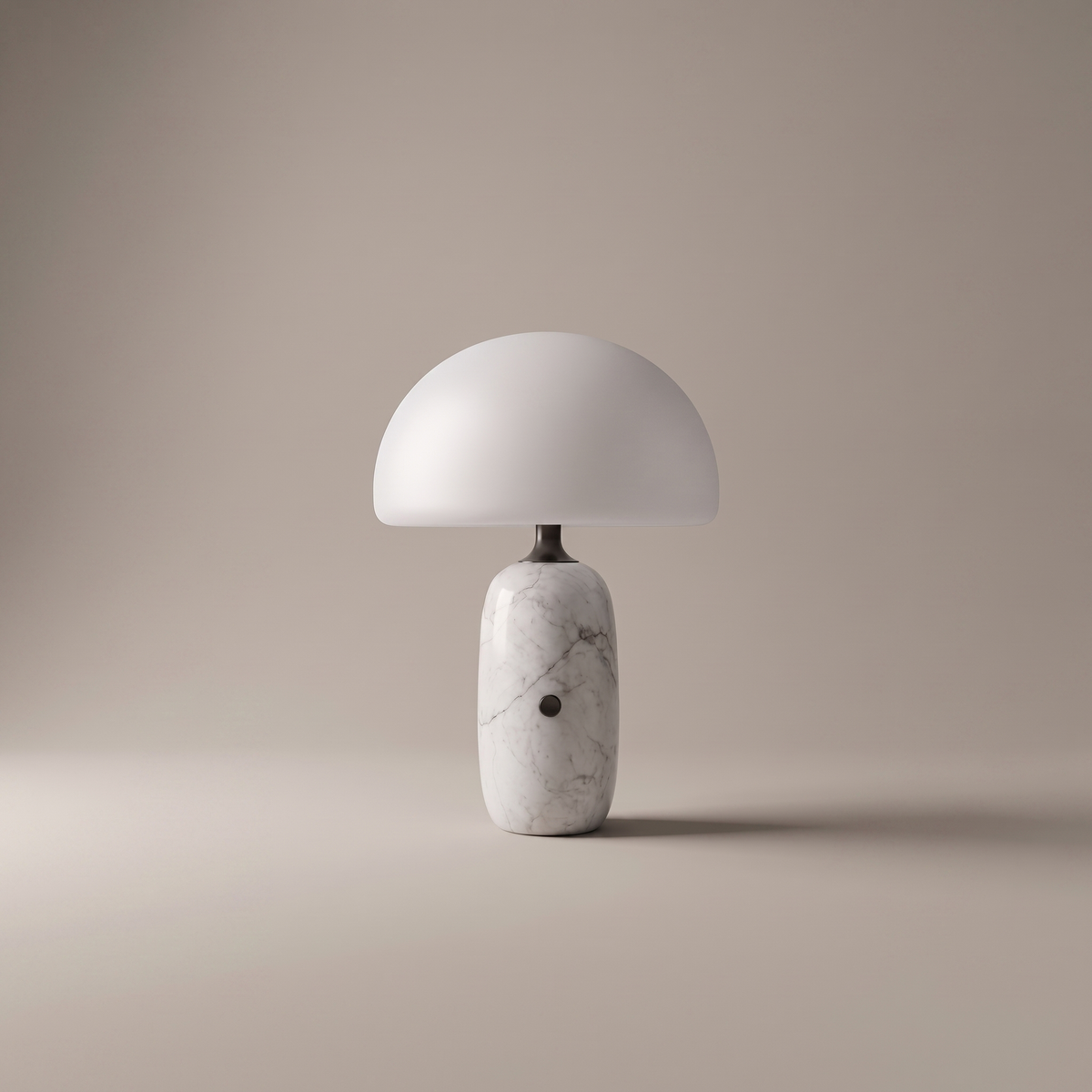 Opaline white Carrara marble and frosted glass LED table lamp on neutral studio backdrop