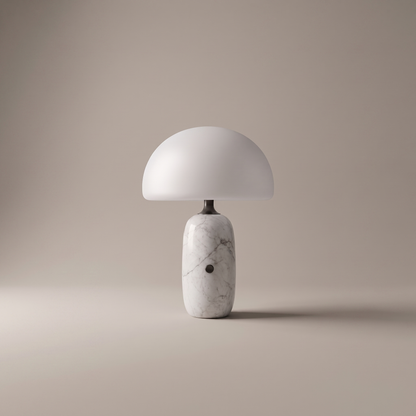 Opaline white Carrara marble and frosted glass LED table lamp on neutral studio backdrop