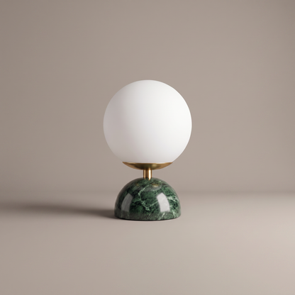 Willowmere modern table lamp with green marble base and brass stem, studio product shot