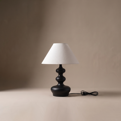 Xanthe sculptural fabric and wood boho table lamp, studio product shot