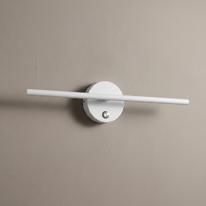 Nordic minimalist white aluminum long bar LED wall sconce with round switch backplate, lamp off on a warm greige plaster wall