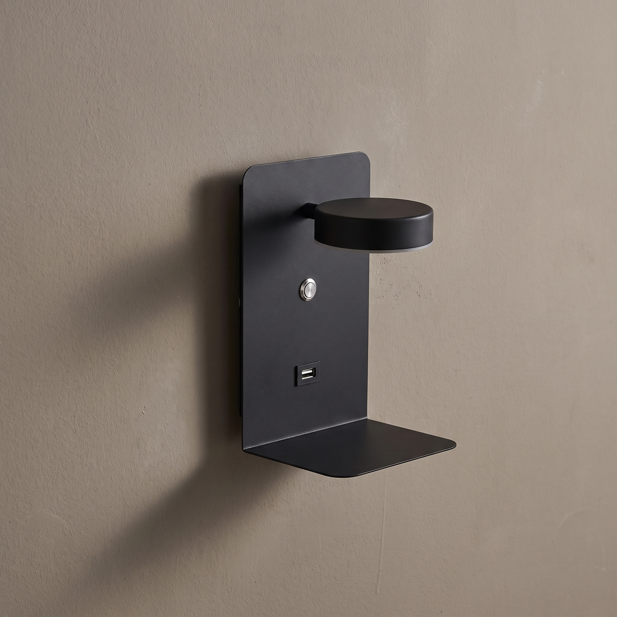Modern square black iron LED wall sconce with shelf, rotatable spotlight head and USB port on a plain greige wall, lamp off