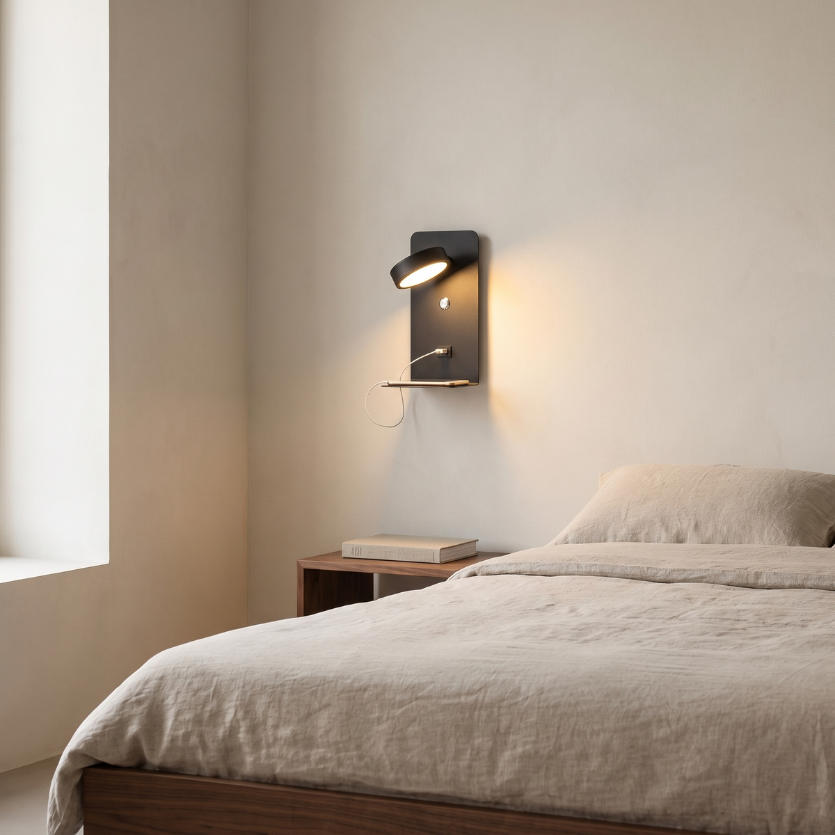 Modern square black iron LED wall sconce with shelf and USB charging port glowing warm beside a walnut bed