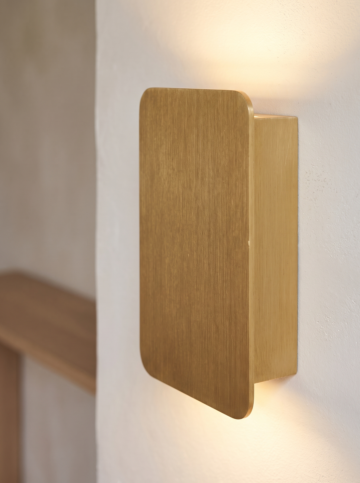 Fiorella wall sconce close up, Light in Hand, Solid on the Wall