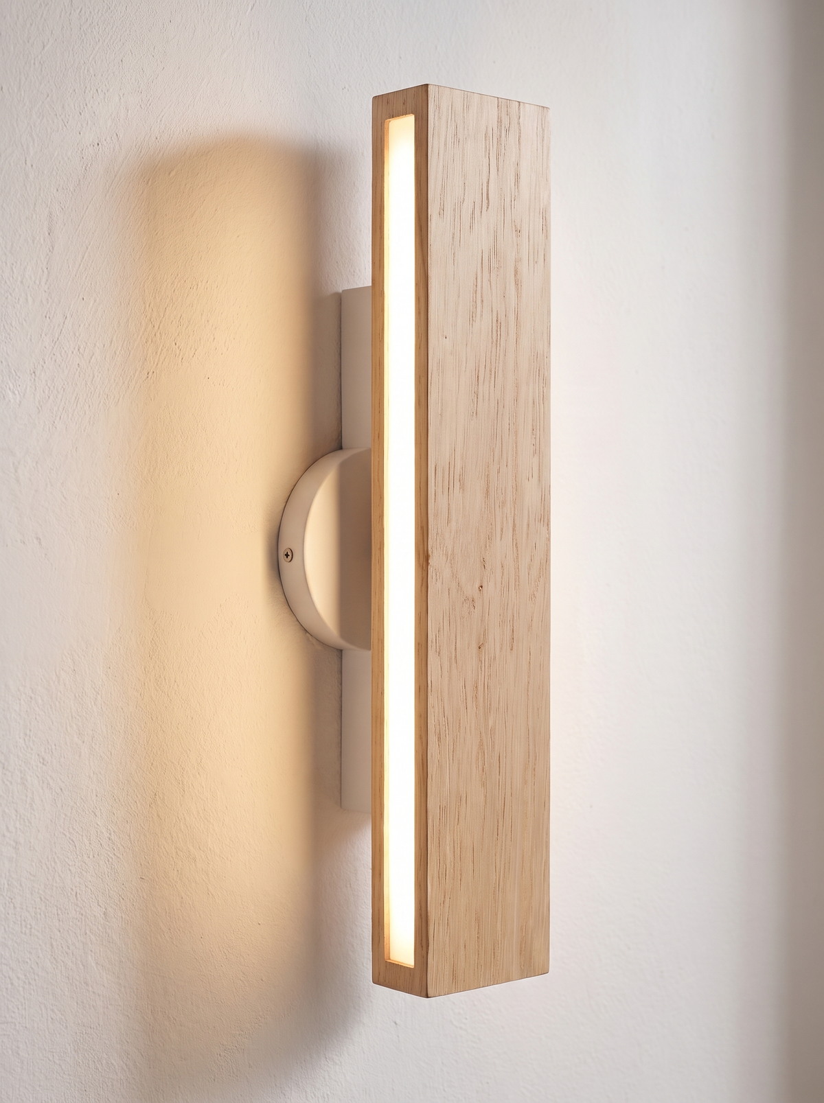 Ravenelle wall sconce close up, The Cool Warm Glow