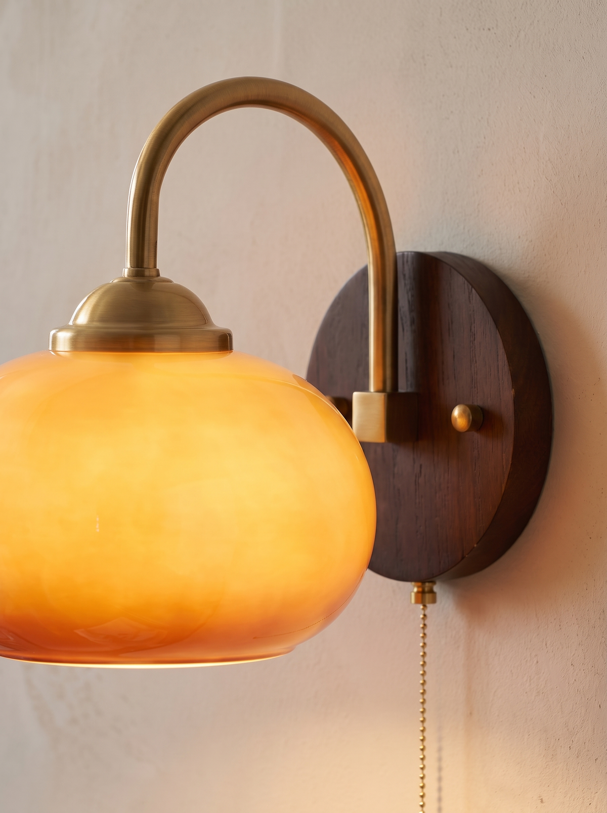 Celestienne wall sconce close up, Focused Warmth