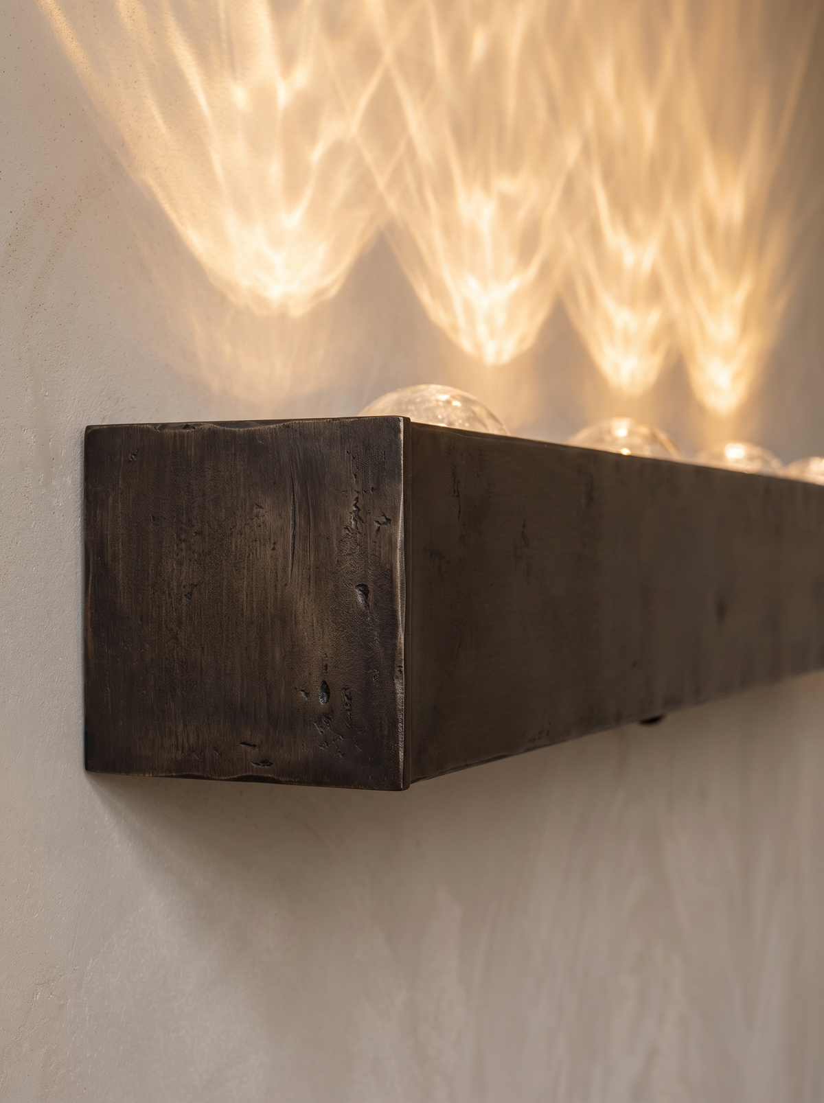 Orlenna wall sconce close up, Sculpted in Iron