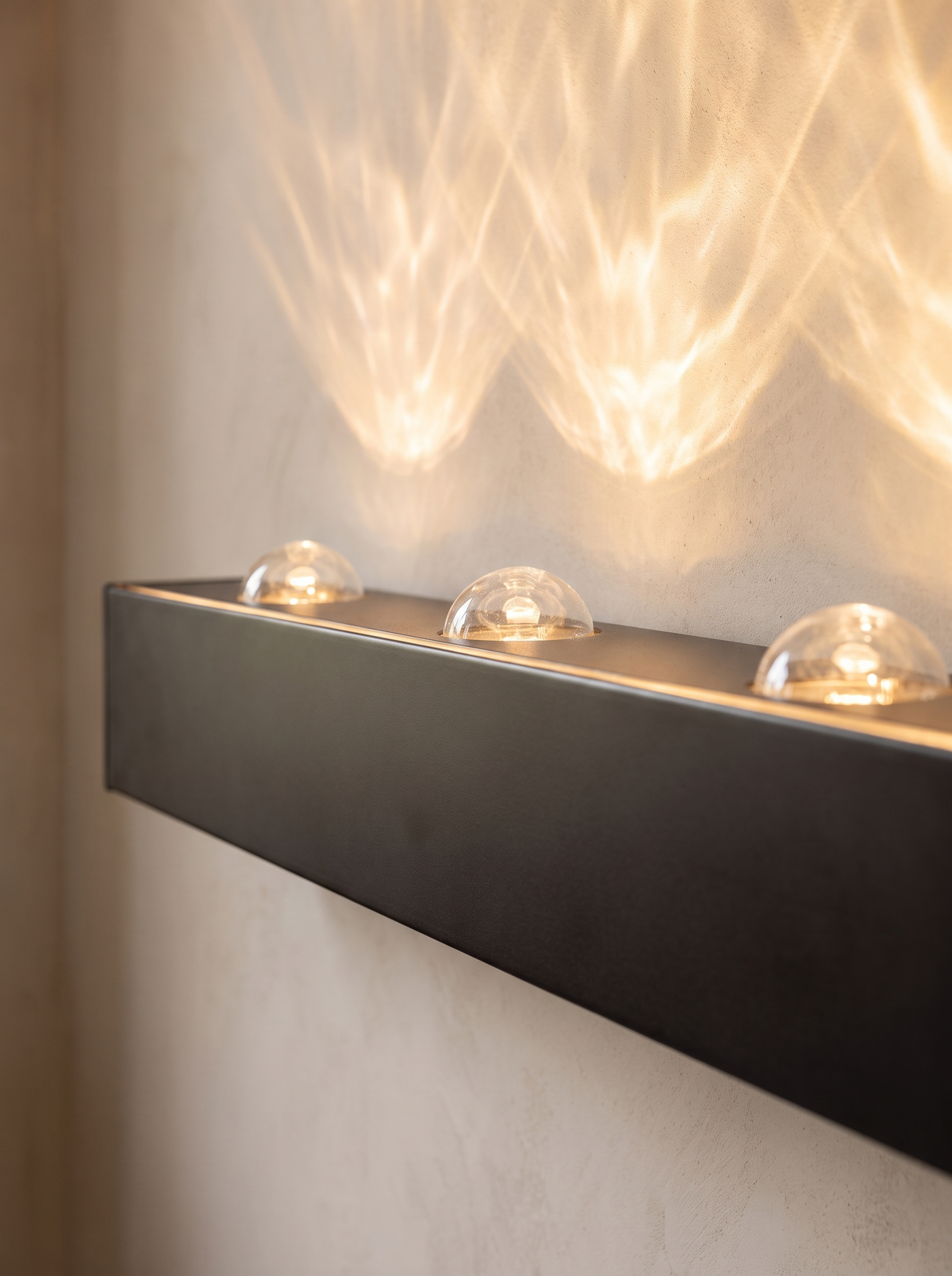 Orlenna wall sconce close up, The Cool Warm Glow