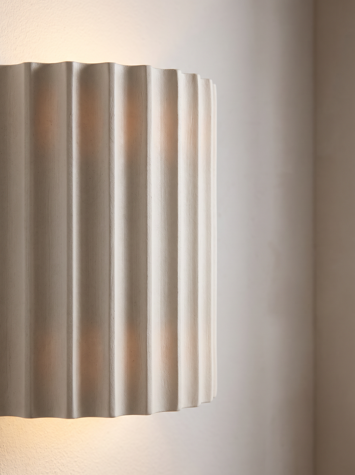 Rosamund wall sconce close up, Sculpted in Cast Resin