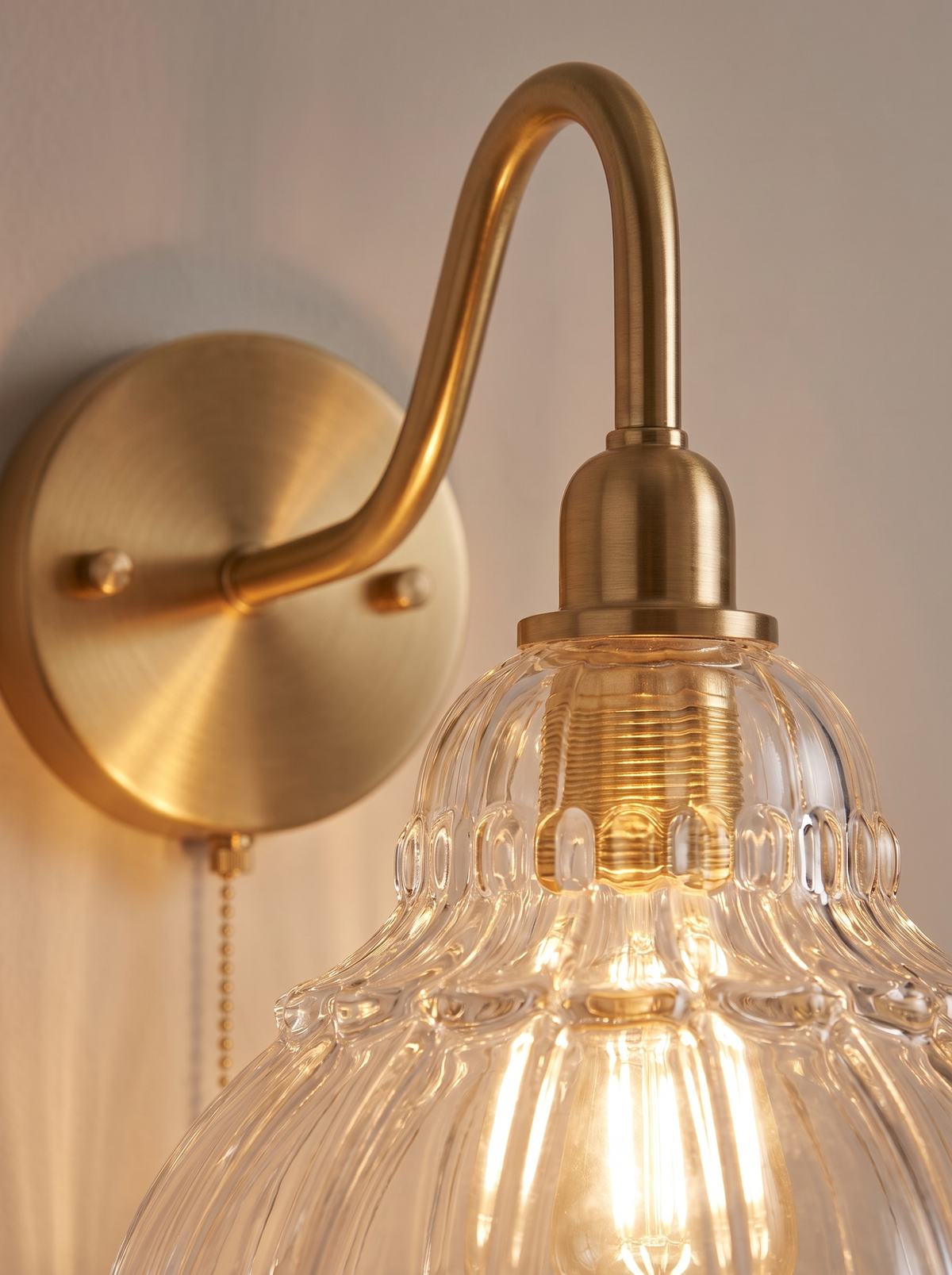 Saphirelle wall sconce close up, Cast in Warm Brass