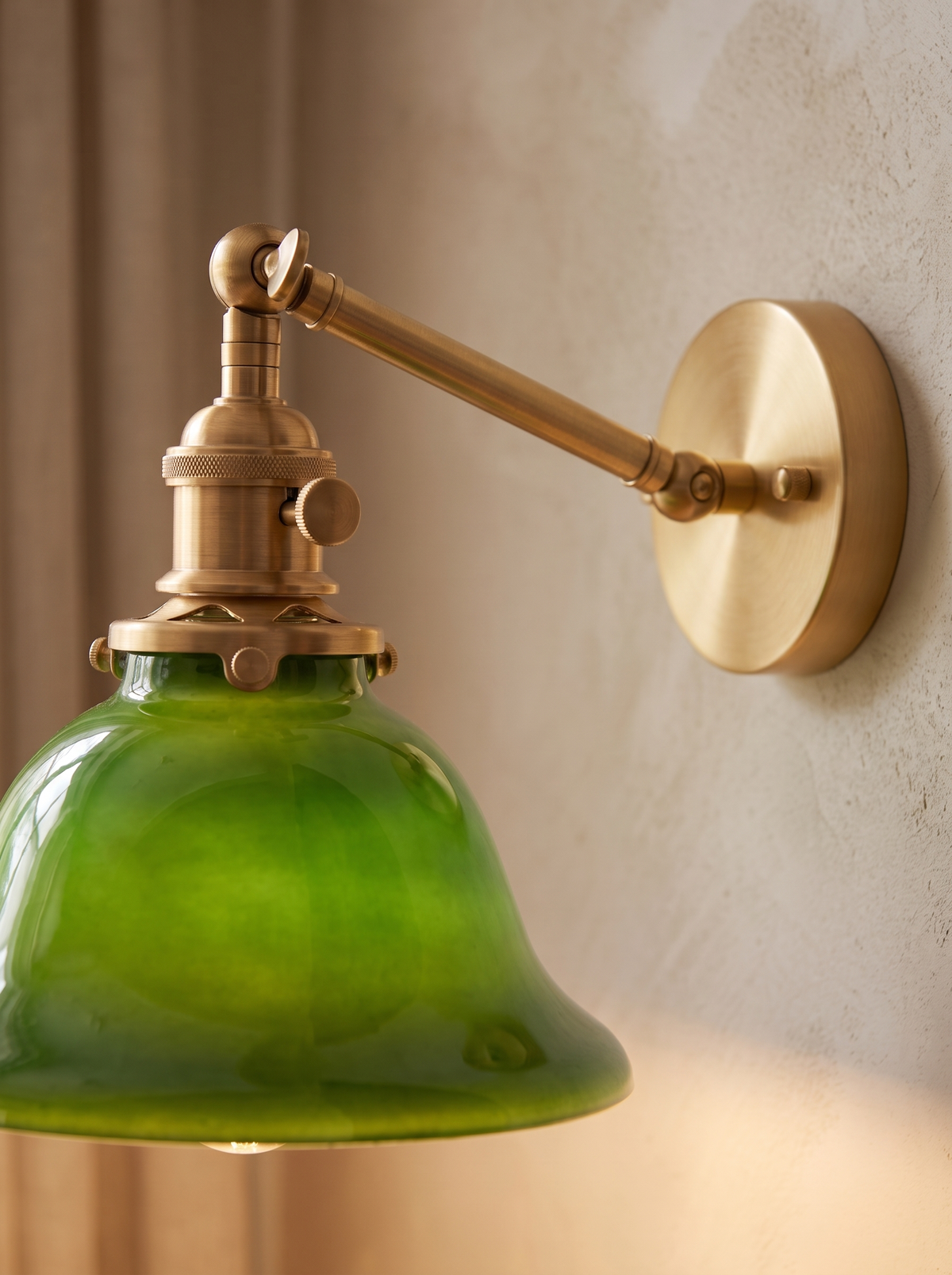 Anouvelle wall sconce close up, Cast in Warm Brass