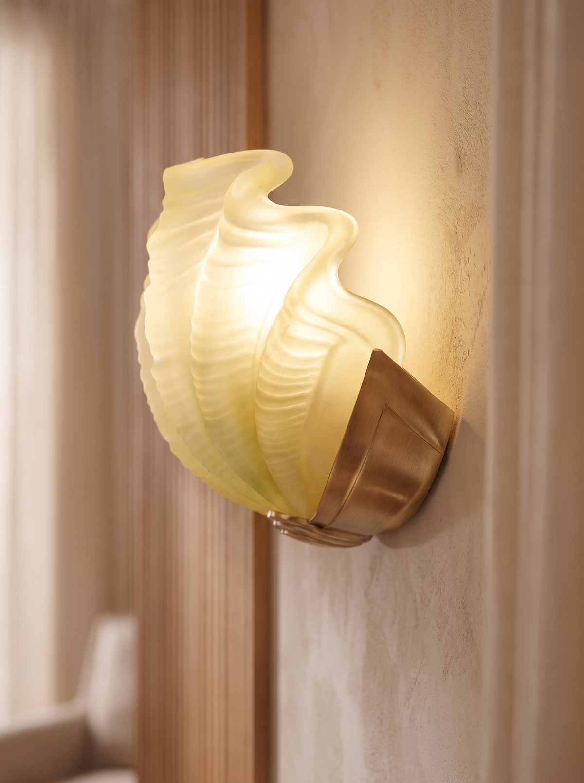 Kirielle wall sconce close up, Cast in Warm Brass