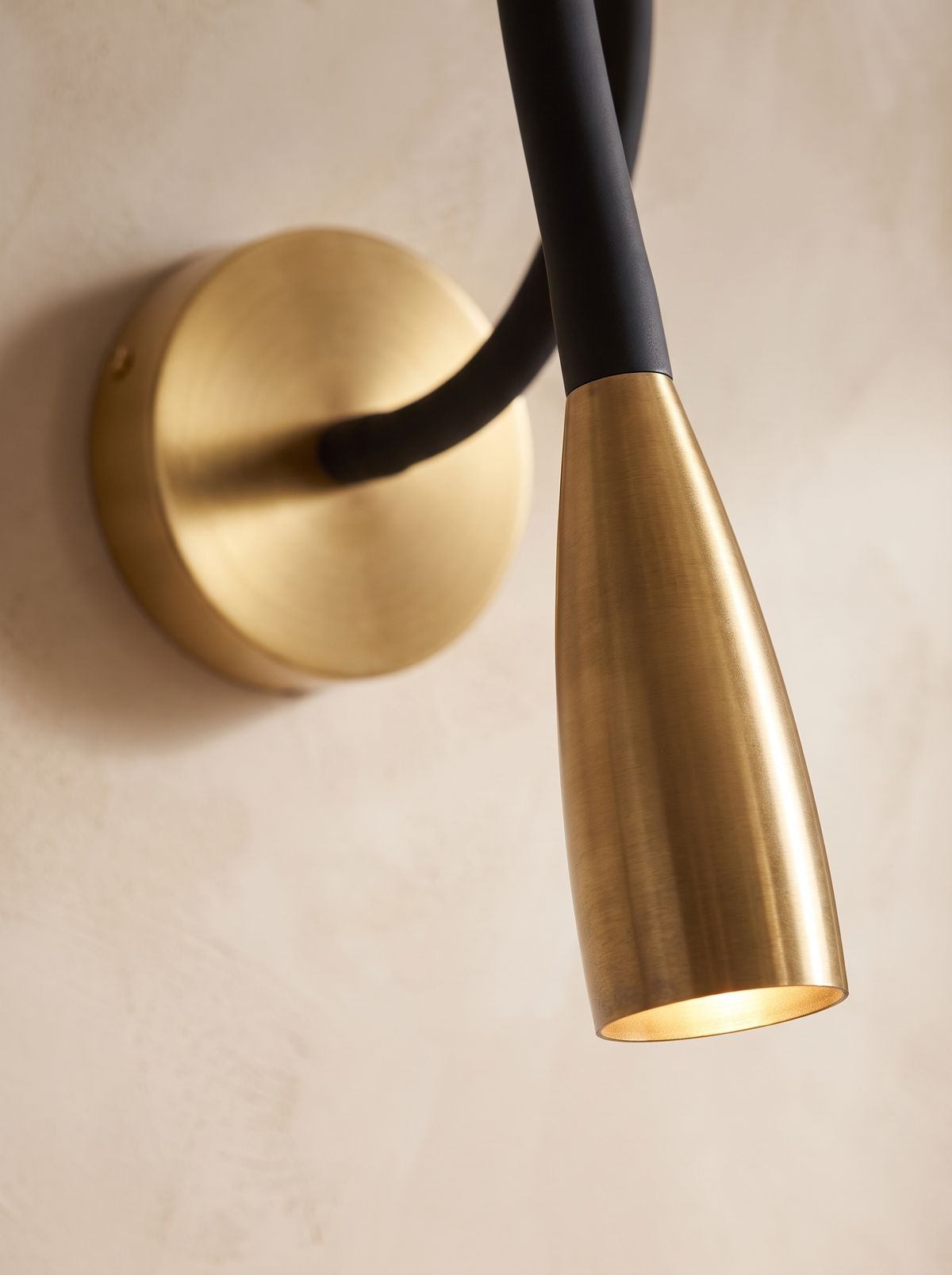 Quenelle wall sconce close up, Guiding Light